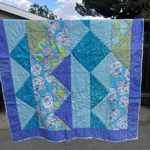 Patchwork Quilt with Floral Patterns